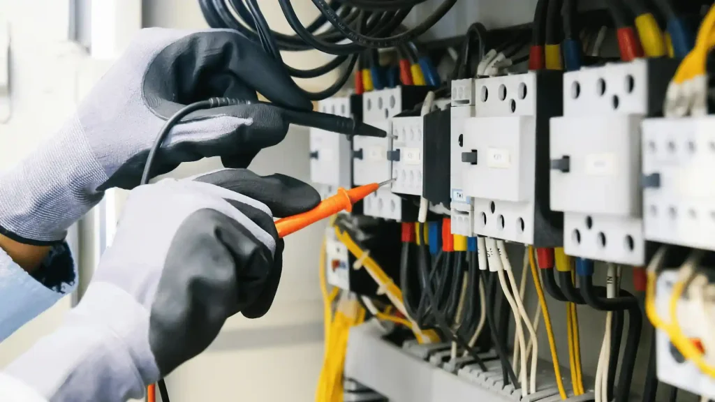 Electrician installing wiring for a dedicated home circuit