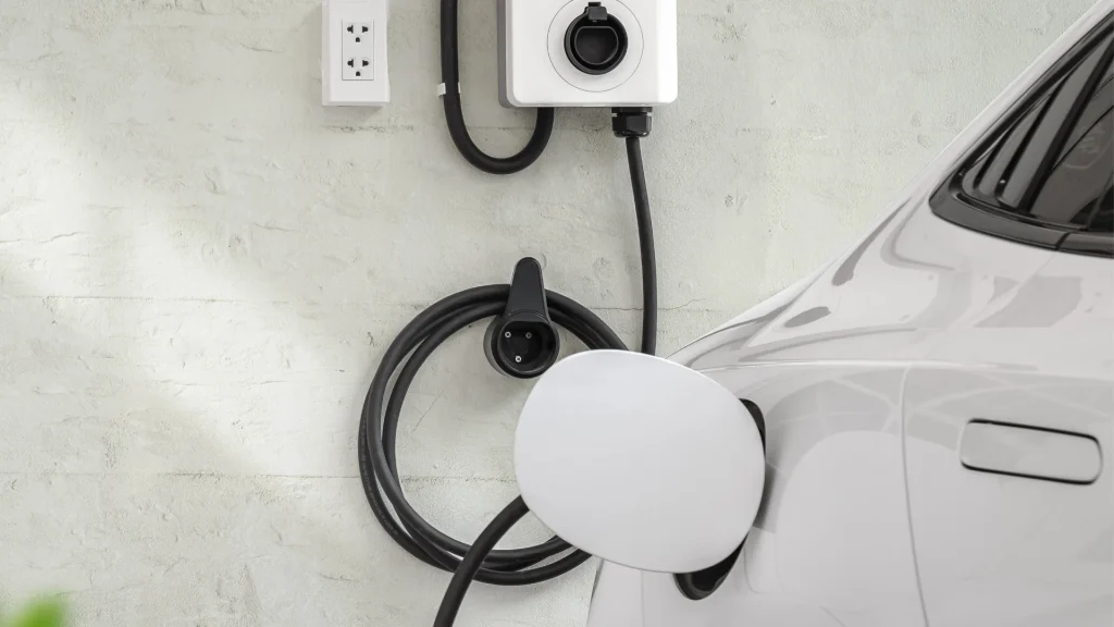 Electric vehicle charger installed in a home garage